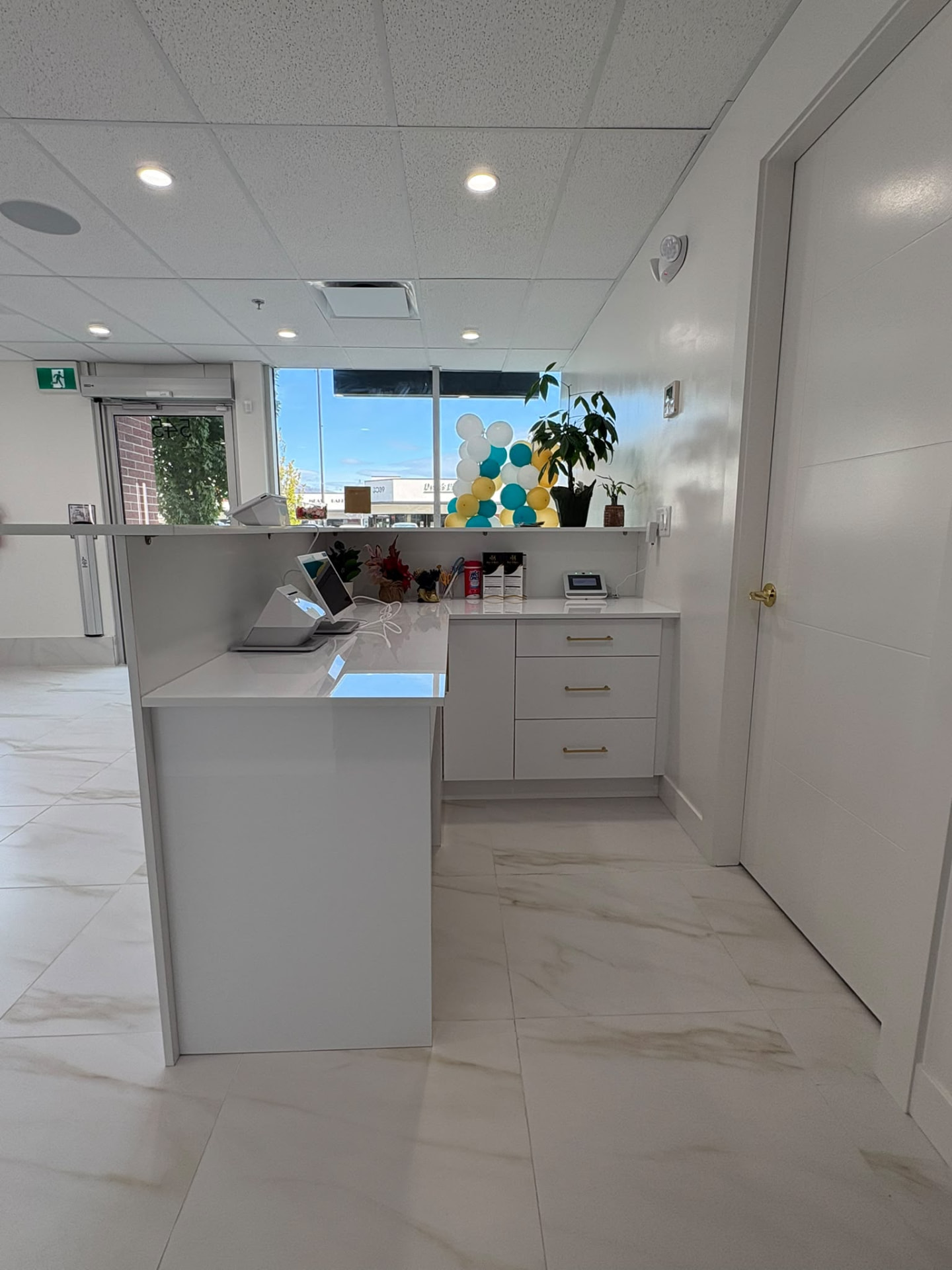 Bright front desk and entry area at Face & Body Beauty Salon