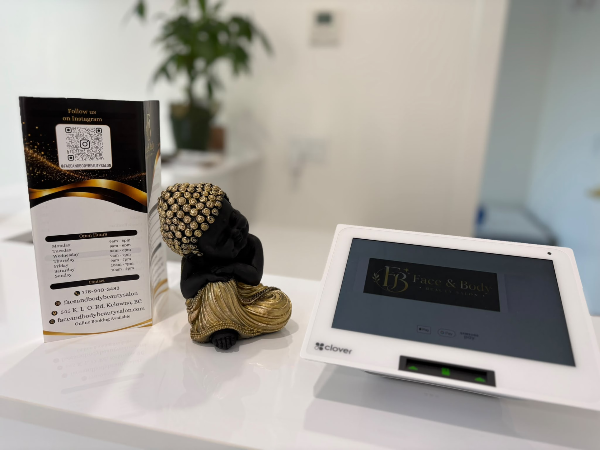 Face & Body Beauty Salon reception counter with booking terminal and branded display